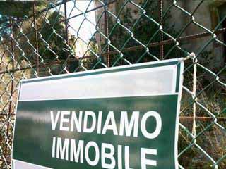 cartello vendiamo immobile